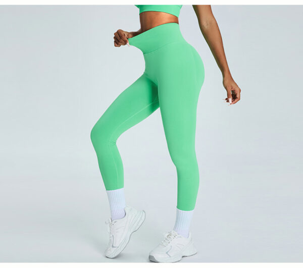 Seamless high-waisted compression leggings for women - squat-proof, breathable, and stretchable for gym, CrossFit, yoga, and running.